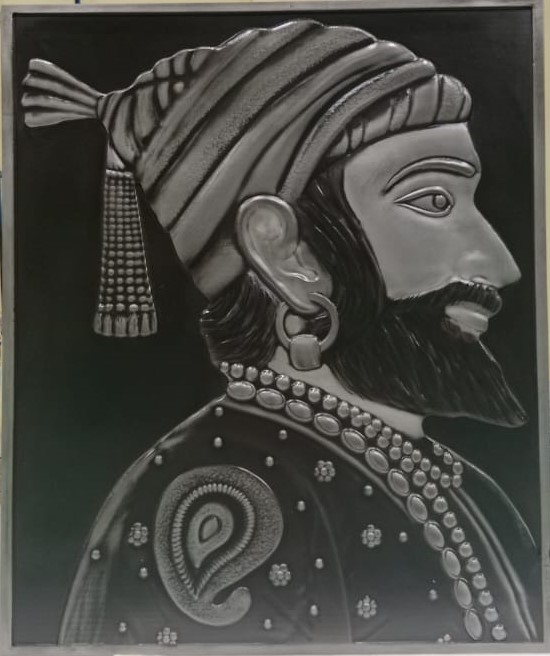 S3 relief portrait in a dark metallic finish